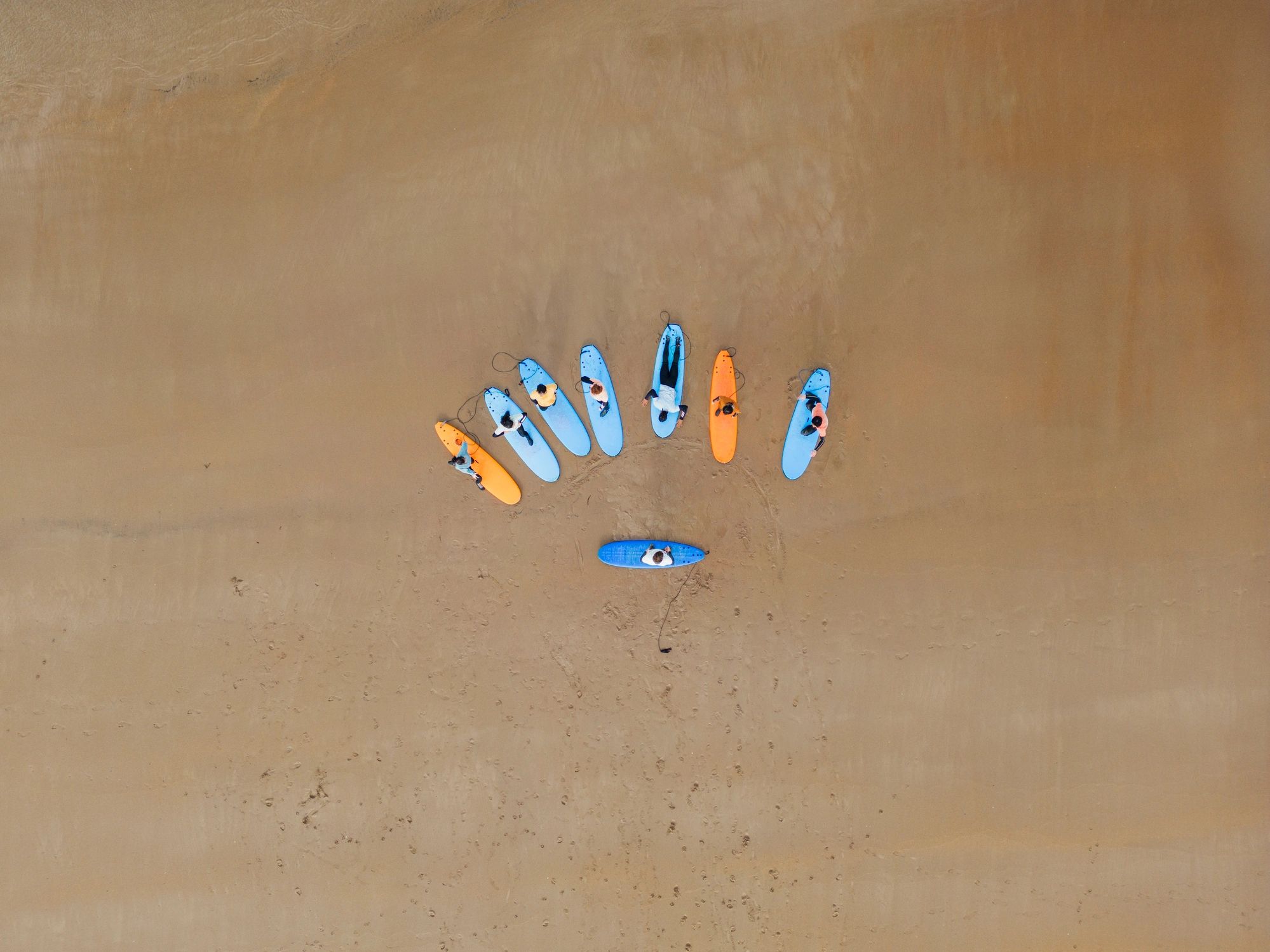 Group lesson on the beach with instructor guidance